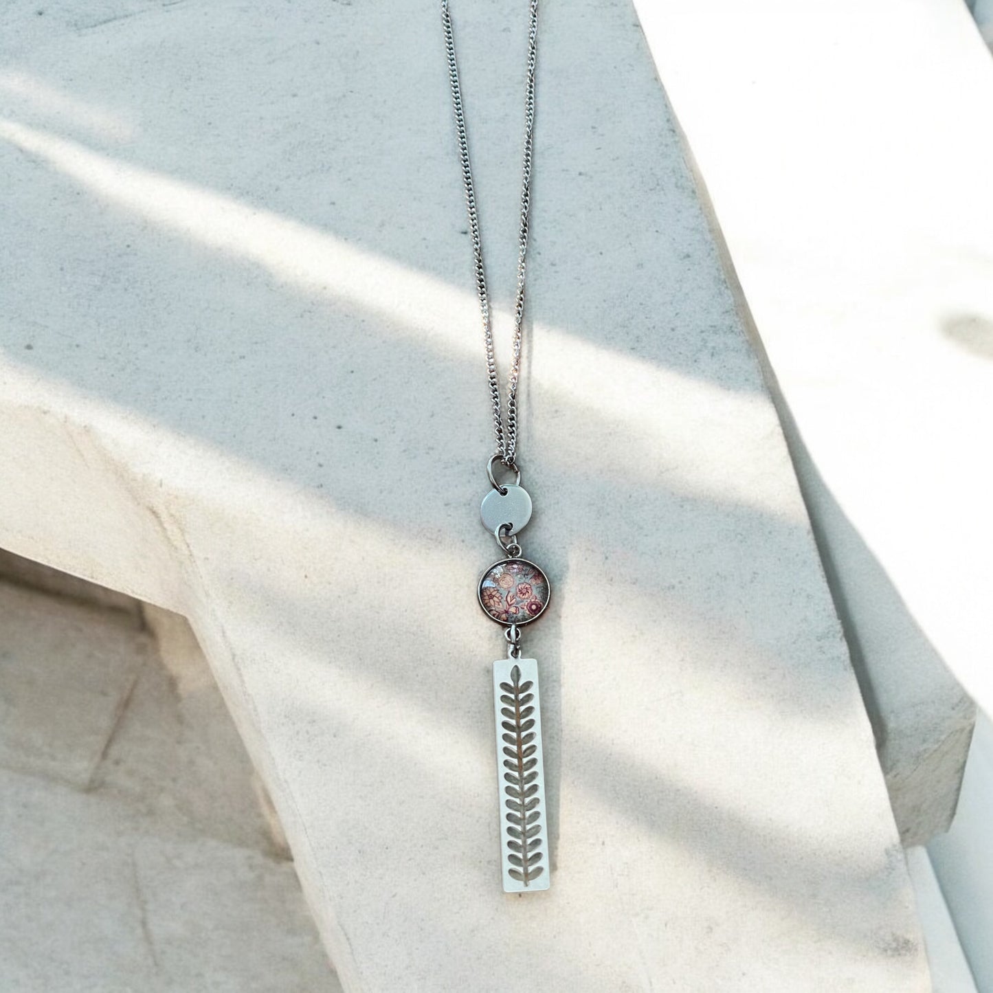 Collier inox gris et pêche