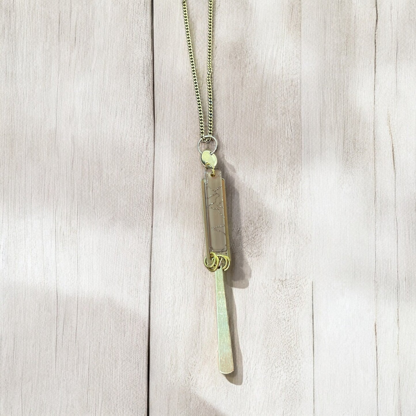 Collier inox or et acétate