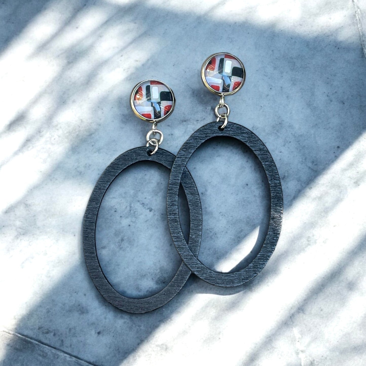 Anneaux de bois et cabochons