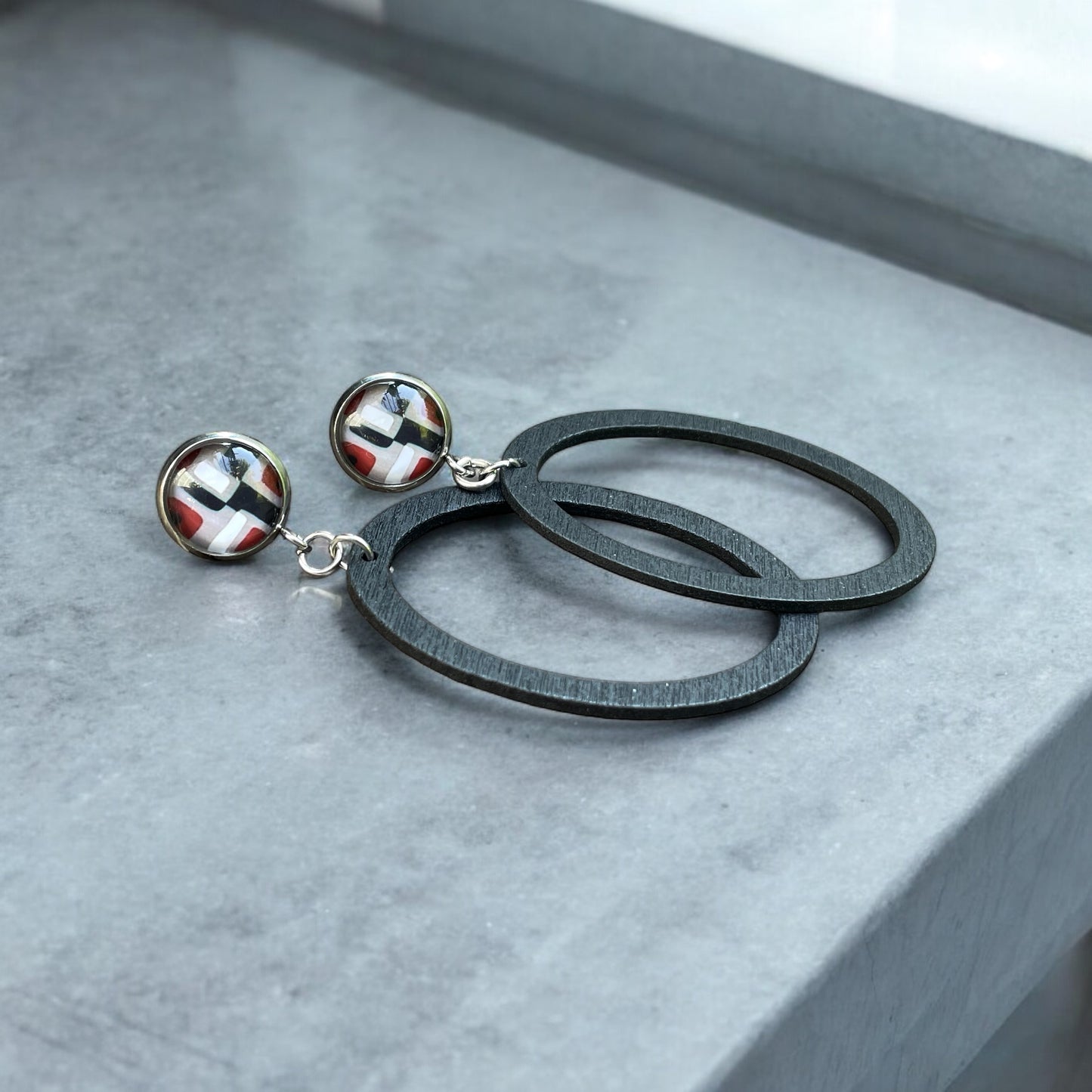 Anneaux de bois et cabochons