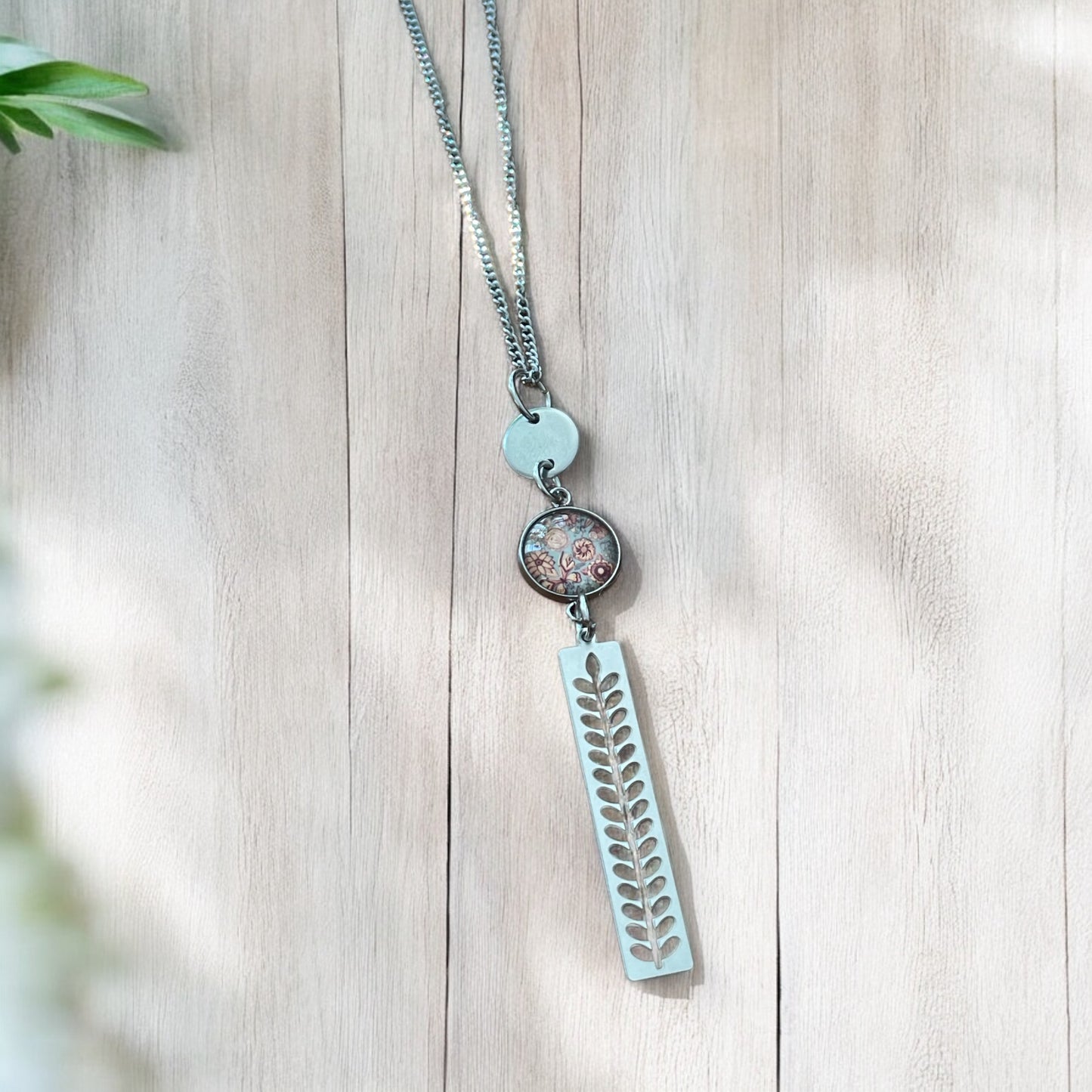 Collier inox gris et pêche
