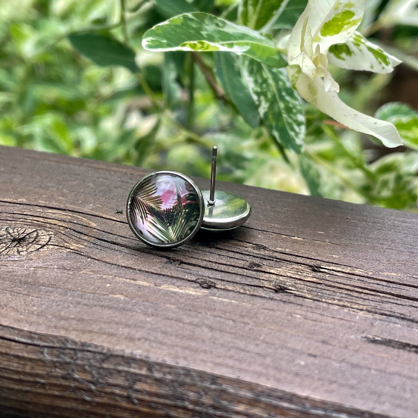 Clous d’oreilles palmiers roses