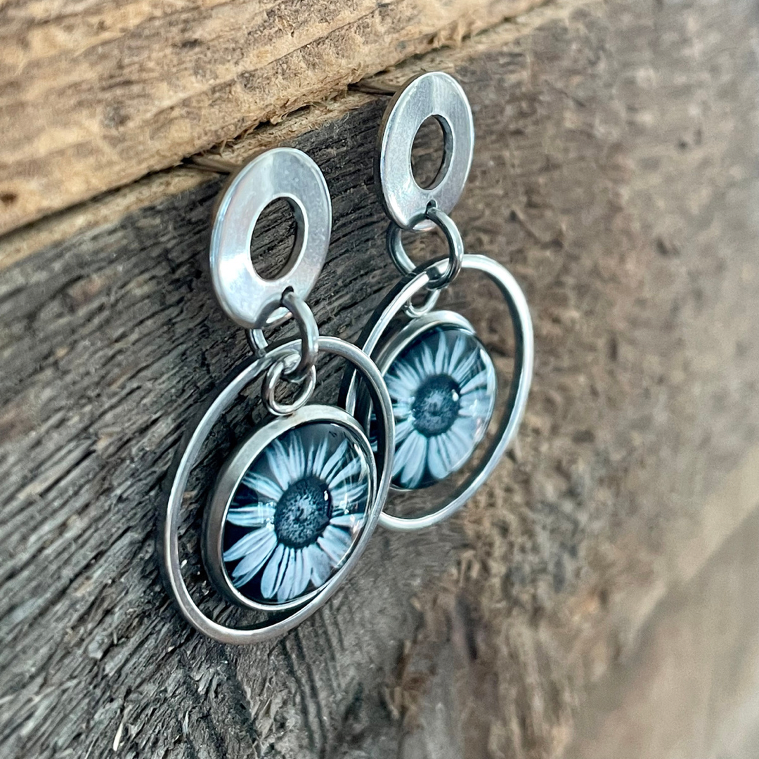 Boucles d’oreilles marguerites noires