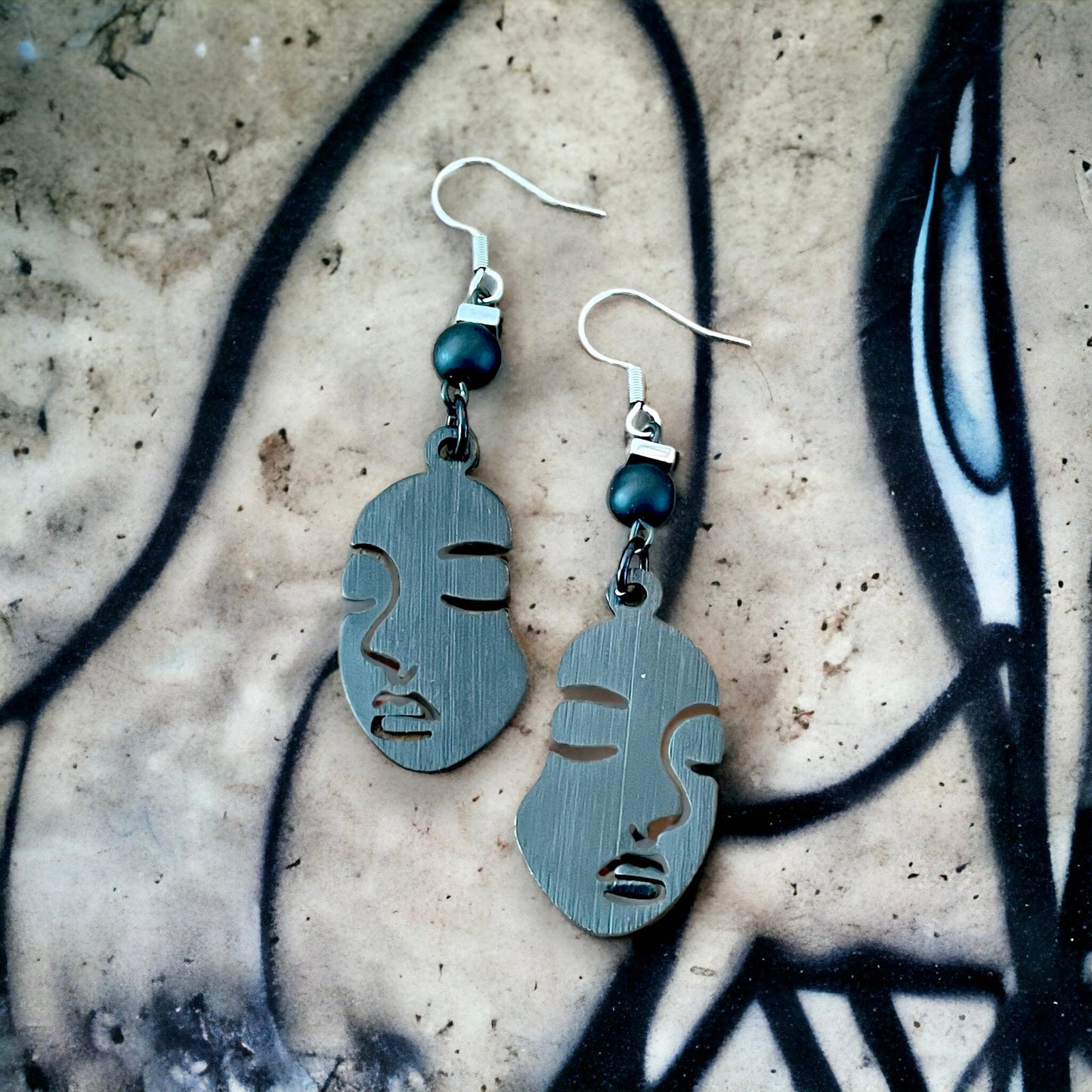 Boucles d’oreilles visage